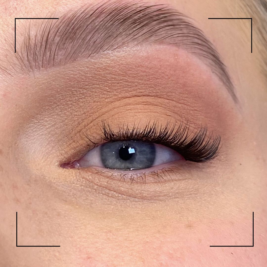 Close-up of a person's eye with false eyelashes