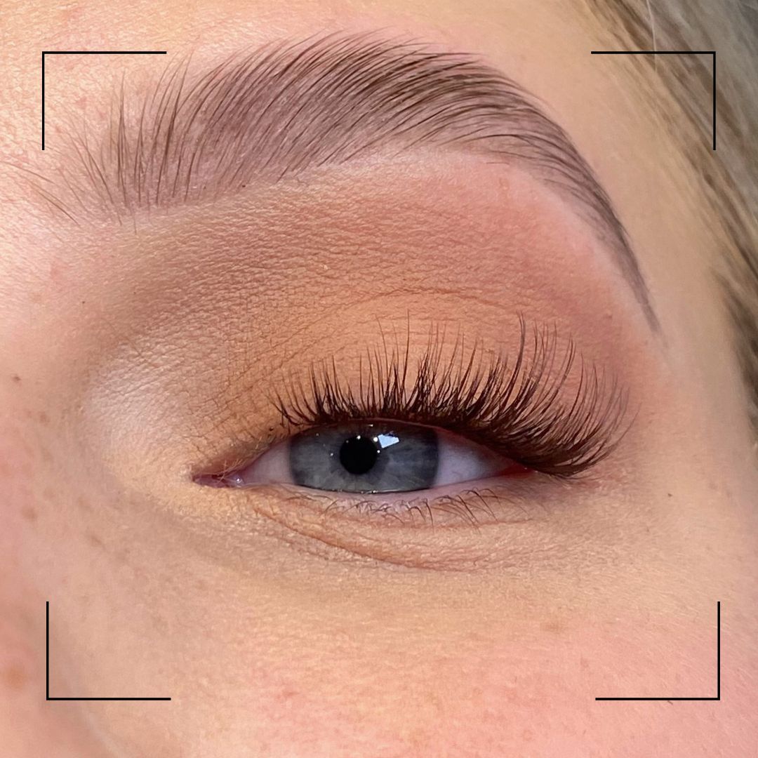 Close-up of a person's eye with false eyelashes