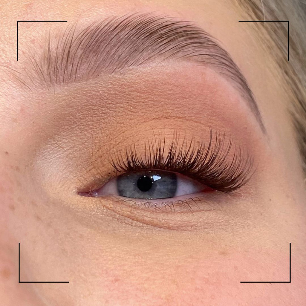 Close-up of a person's eye with false eyelashes